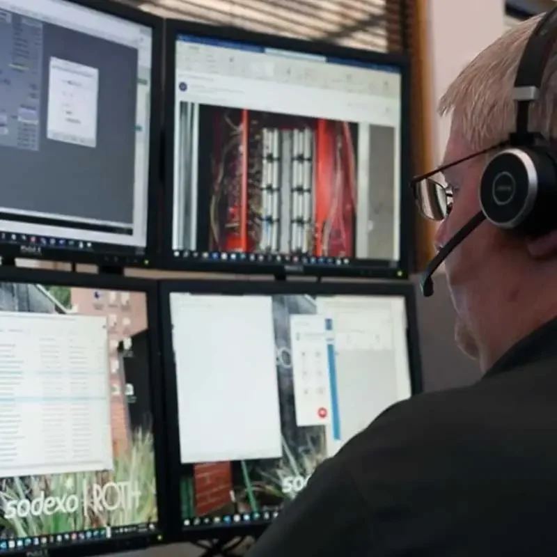 man with headset working on building automation at Roth
